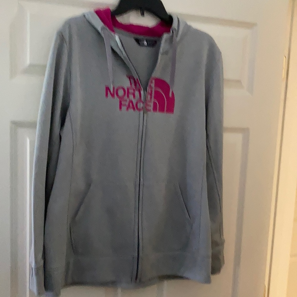 North Face zip up sweatshirt - gray with hot pink writing, hood and thumb holes.